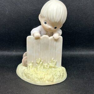 Precious Moments "It May Be Greener, But It's Just As Hard To Cut" figurine